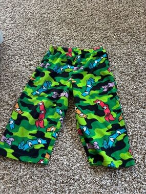 Kids Neon Green Camouflage Fleece Pants with Cartoon Eyes